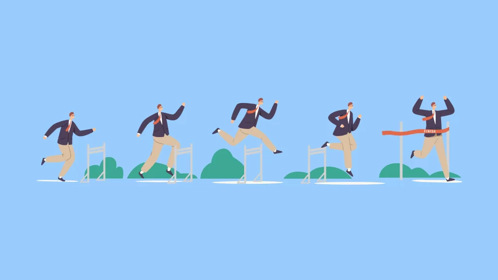 people jumping over hurdles 